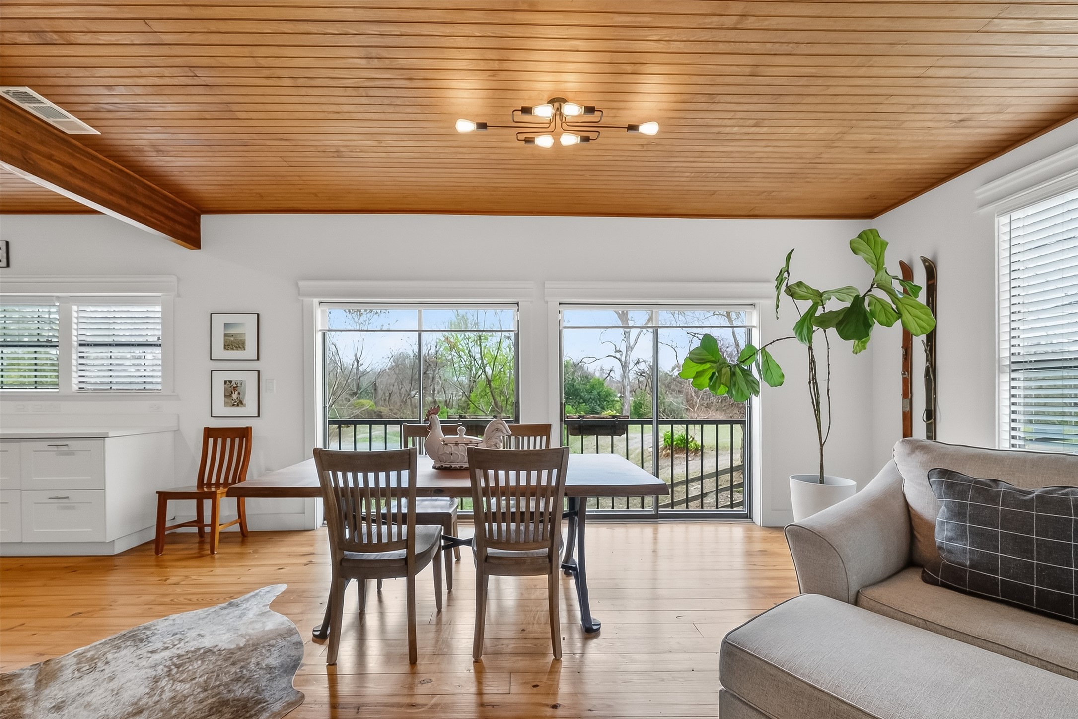 1808 Tabor Street Houston, TX 77009 - Photo 7 of 26 a dining room with furniture window and wooden floor