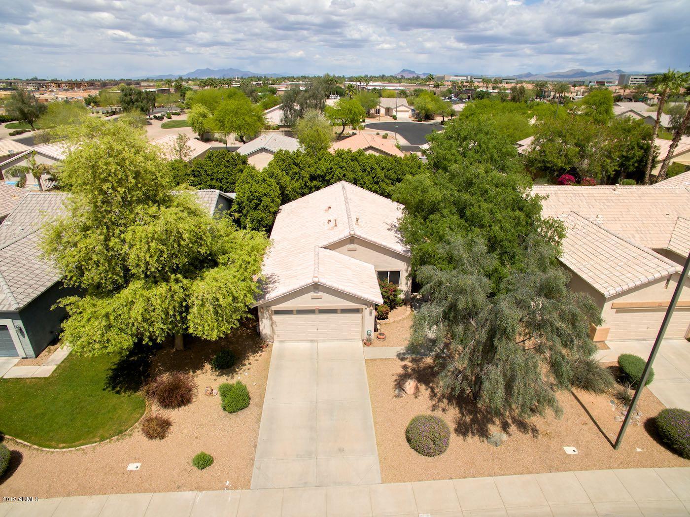 2908 East Harwell Road Gilbert, AZ 85234 - Photo 3 of 38 an aerial view of a house with a yard and lake view