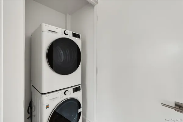 a utility room with dryer and washer