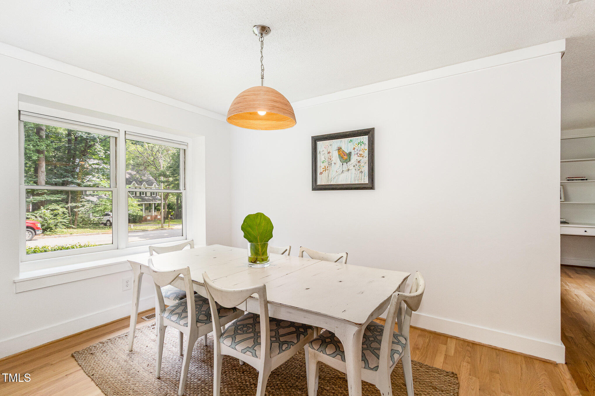 6025 Tarnhour Court Raleigh, NC 27612 - Photo 14 of 27 a view of a dining room with furniture and window