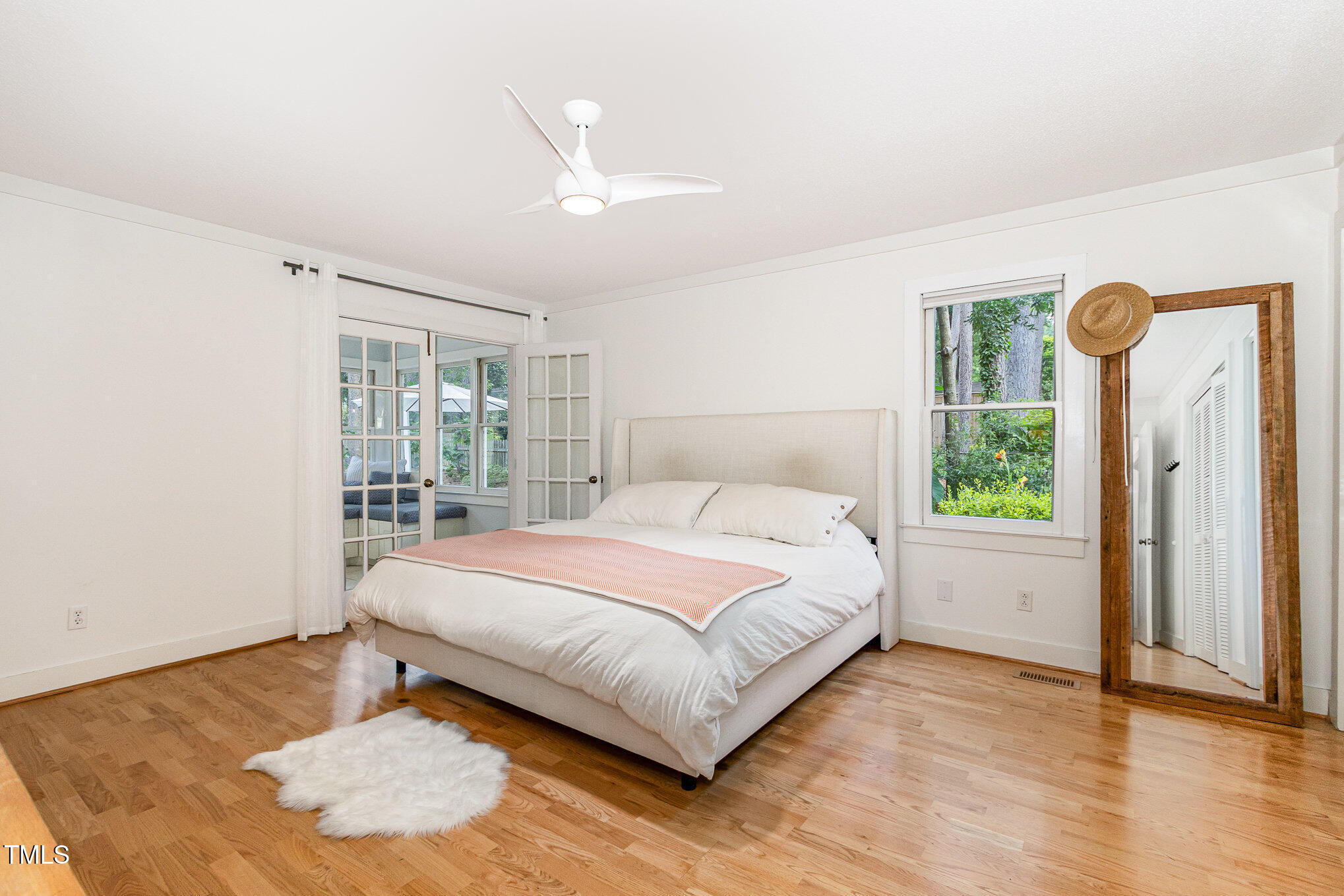 6025 Tarnhour Court Raleigh, NC 27612 - Photo 18 of 27 a bedroom with a bed and a window