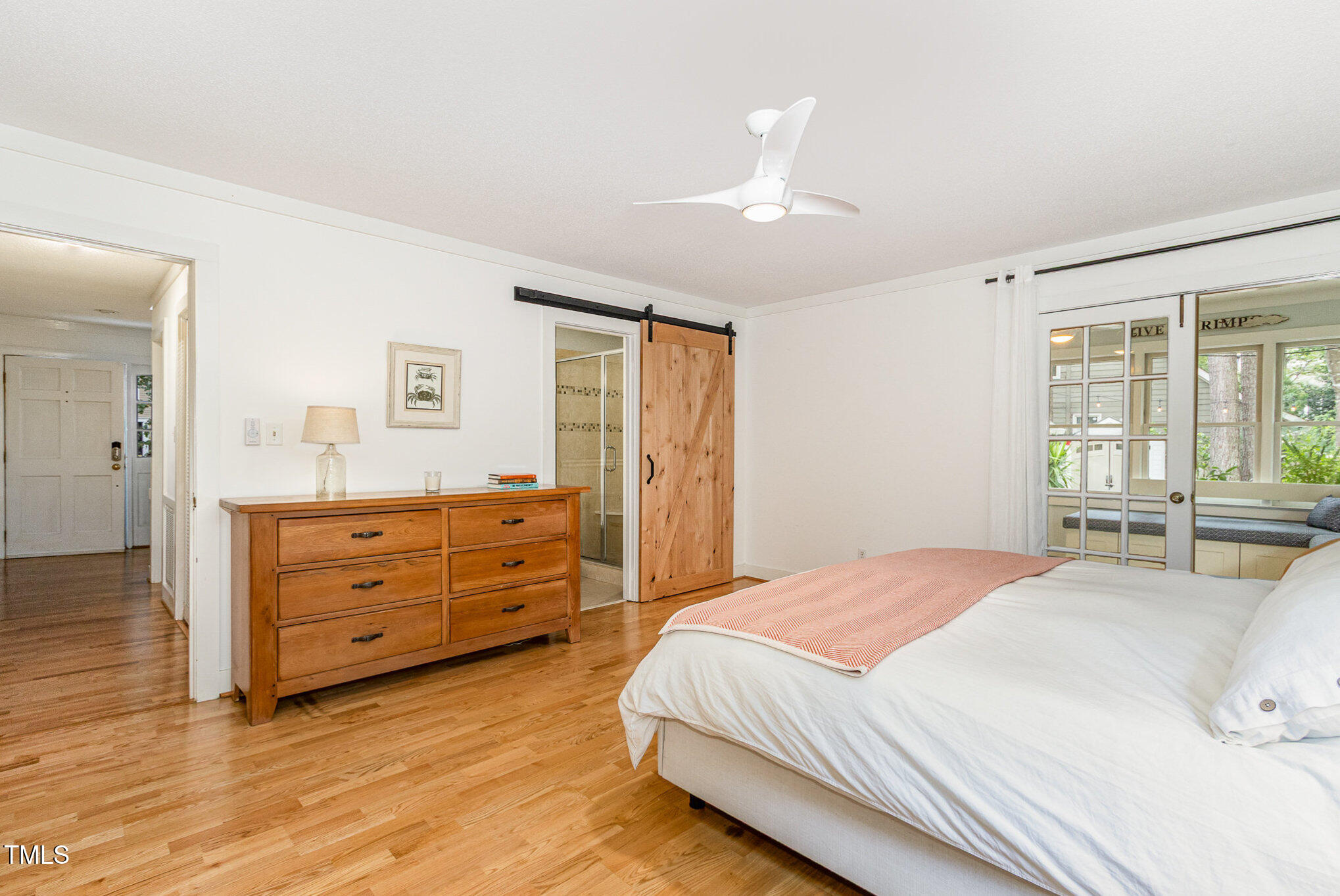 6025 Tarnhour Court Raleigh, NC 27612 - Photo 20 of 27 a bedroom with a bed and a dresser