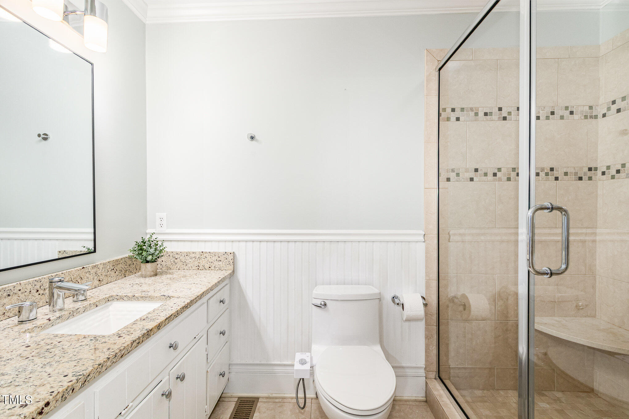 6025 Tarnhour Court Raleigh, NC 27612 - Photo 21 of 27 a bathroom with a granite countertop sink toilet and shower