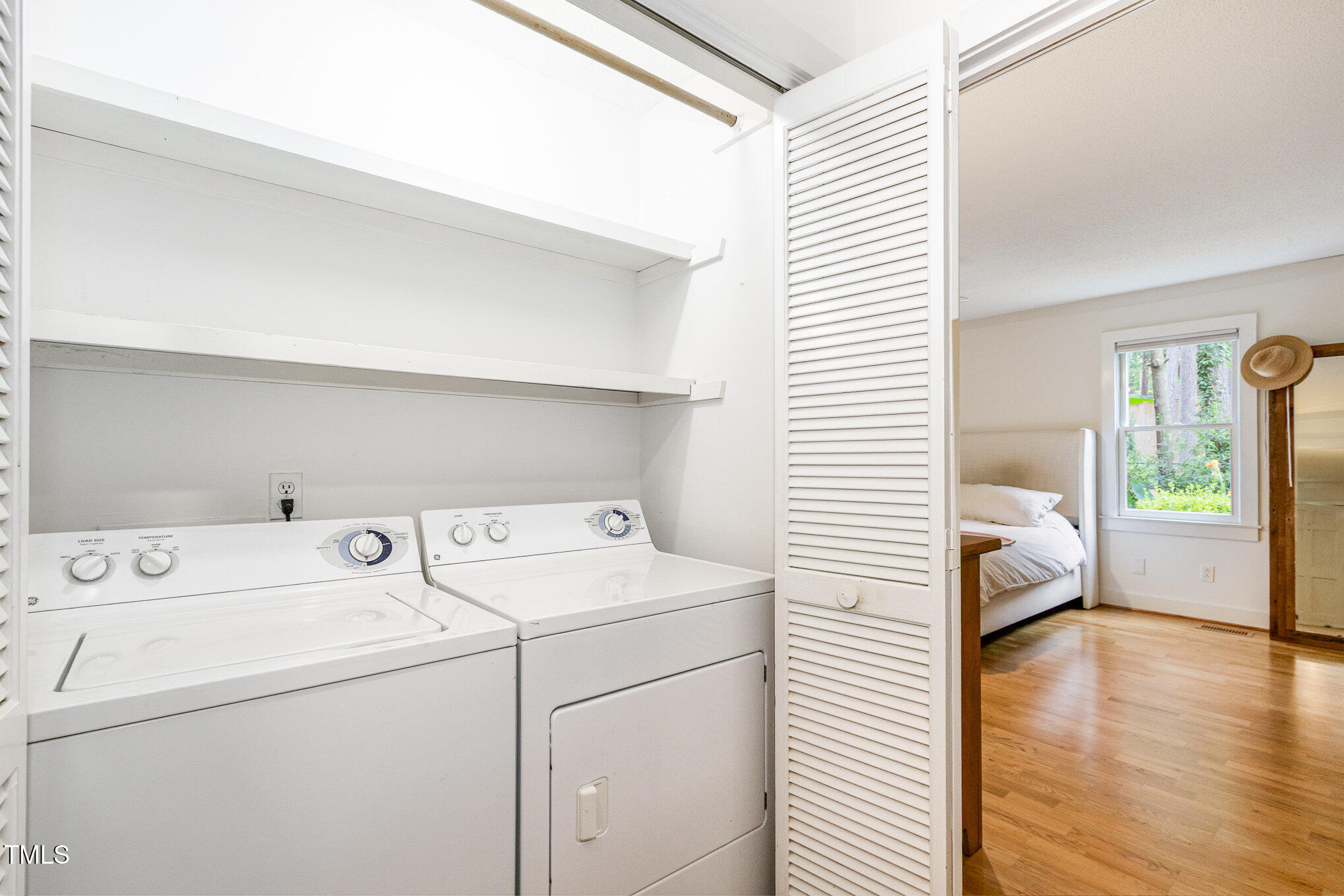 6025 Tarnhour Court Raleigh, NC 27612 - Photo 23 of 27 a utility room with dryer and washer