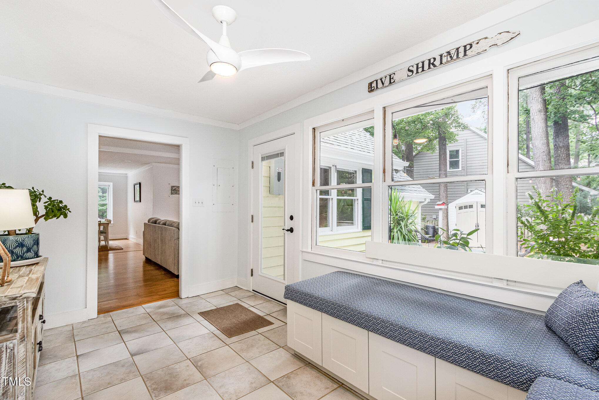6025 Tarnhour Court Raleigh, NC 27612 - Photo 8 of 27 a living room with a large window and furniture