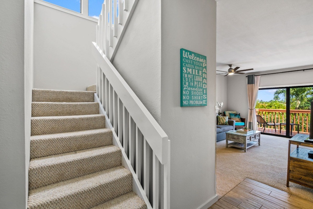 2370 Ho'ohu Road, Unit 522 Koloa, HI 96756 - Photo 15 of 29 a view of hallway with stairs and furniture