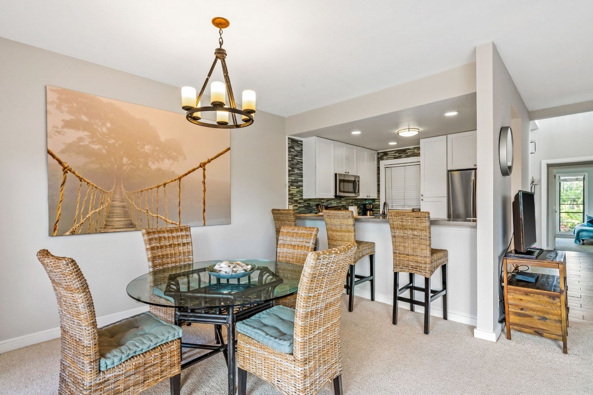 2370 Ho'ohu Road, Unit 522 Koloa, HI 96756 - Photo 6 of 29 a view of a dining room with furniture