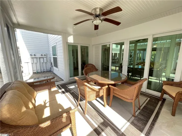 a bathroom with a shower and a glass door