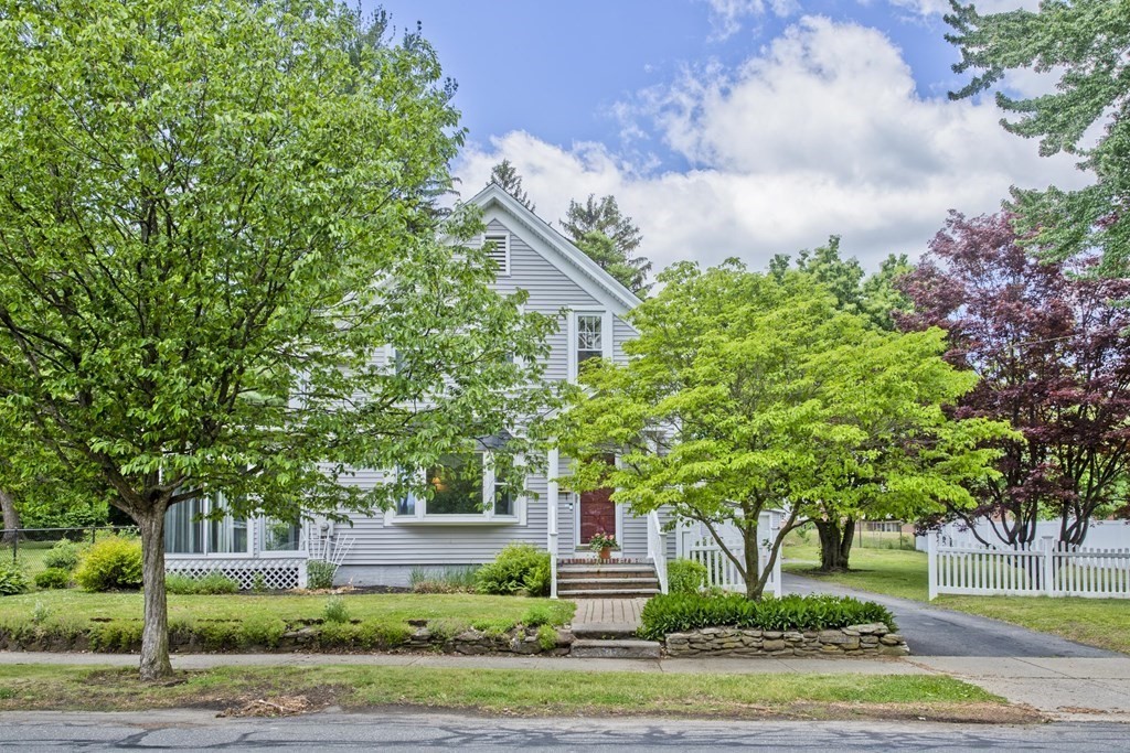 144 Pasco Road Springfield, MA 01151 - Photo 1 of 42 a front view of a house with a yard