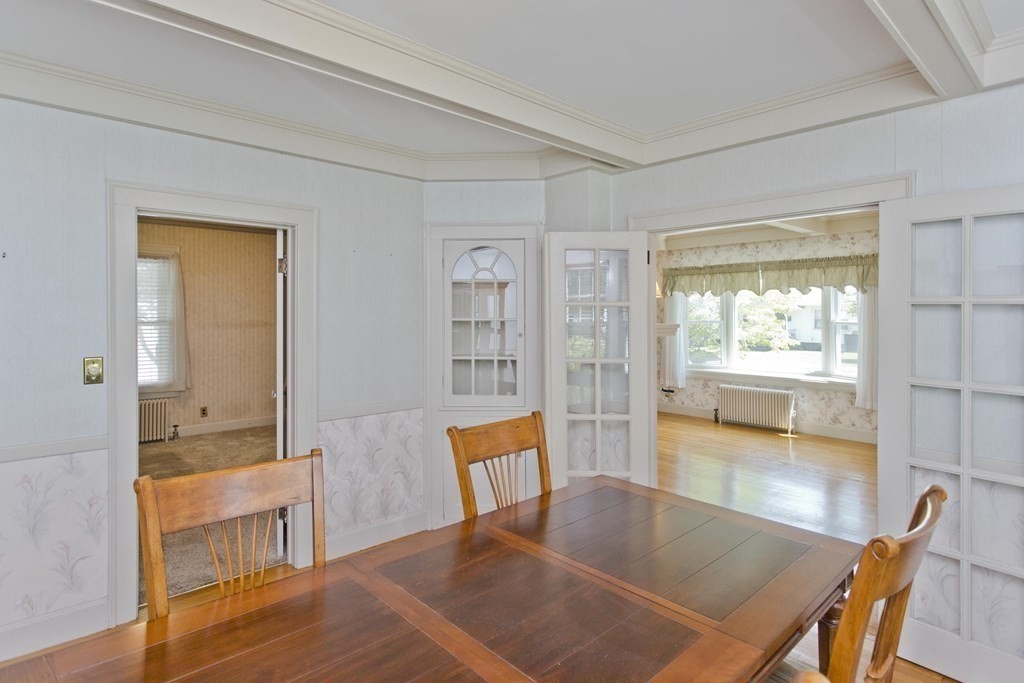 144 Pasco Road Springfield, MA 01151 - Photo 14 of 42 a view of a dining room with furniture and wooden floor