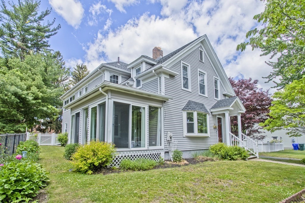144 Pasco Road Springfield, MA 01151 - Photo 2 of 42 front view of a house with a yard