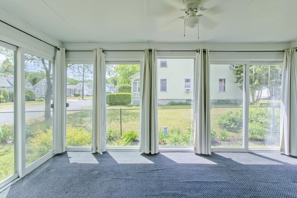 144 Pasco Road Springfield, MA 01151 - Photo 21 of 42 a view of an empty room with wooden floor and a window