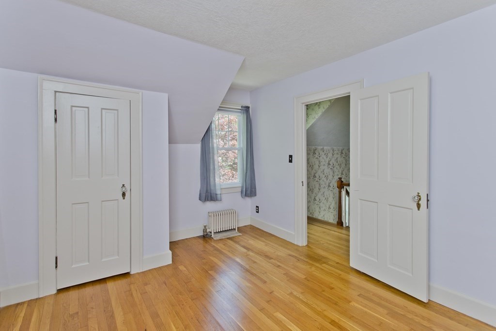 144 Pasco Road Springfield, MA 01151 - Photo 26 of 42 a view of empty room with wooden floor