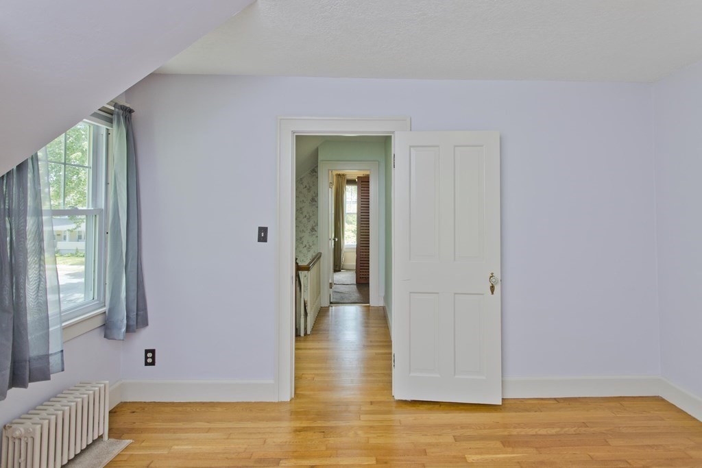 144 Pasco Road Springfield, MA 01151 - Photo 28 of 42 a view of a room with wooden floor