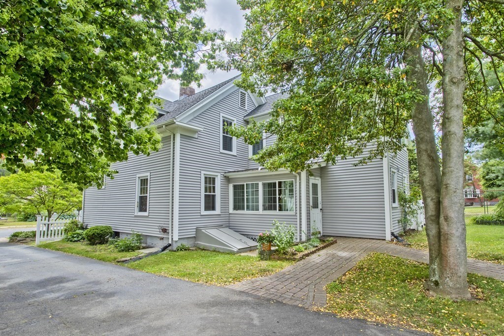 144 Pasco Road Springfield, MA 01151 - Photo 3 of 42 front view of house with a yard