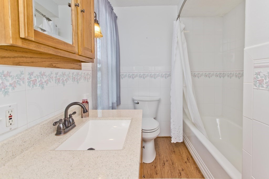 144 Pasco Road Springfield, MA 01151 - Photo 33 of 42 a bathroom with a sink a toilet and a bathtub