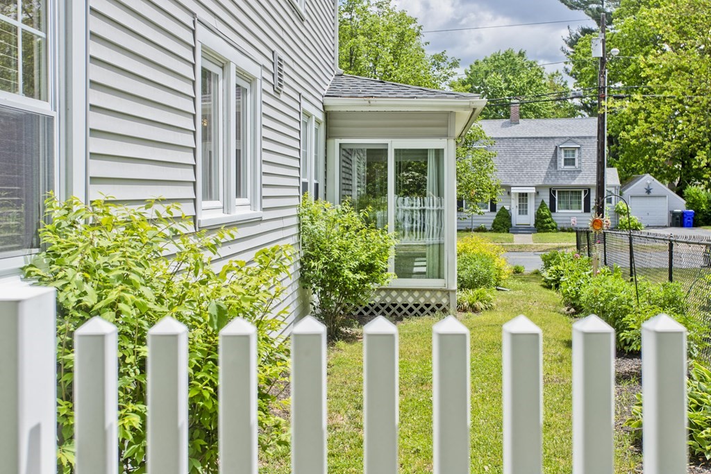 144 Pasco Road Springfield, MA 01151 - Photo 42 of 42 a front view of a house with a yard