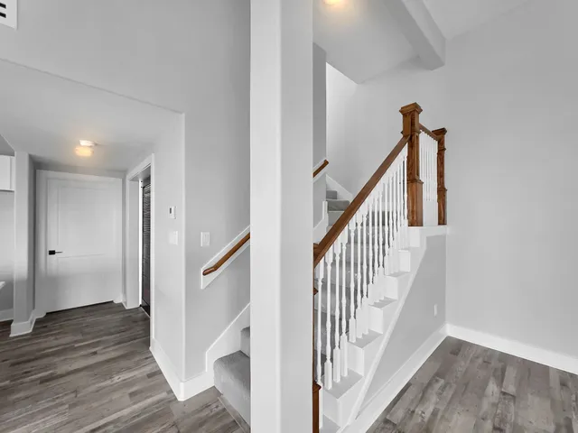 a view of entryway with wooden floor