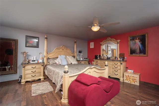 a bathroom with a sink mirror vanity and shower