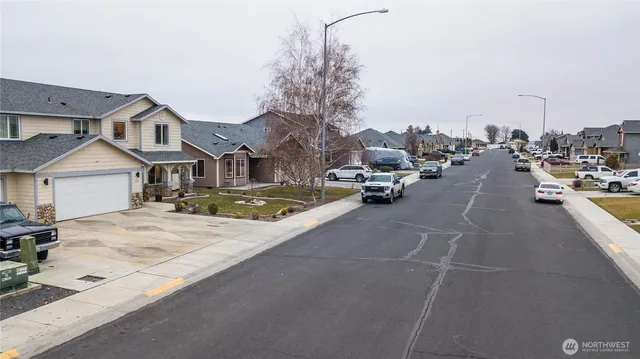 a view of a street with cars