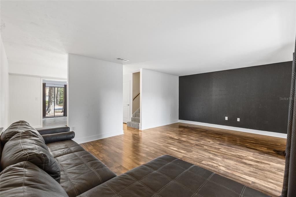 507 Northwest 39th Road, Unit 320 Gainesville, FL 32607 - Photo 16 of 33 a view of a livingroom with a couch