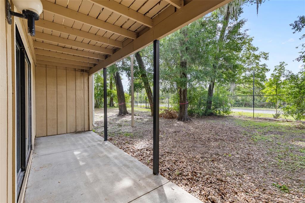 507 Northwest 39th Road, Unit 320 Gainesville, FL 32607 - Photo 31 of 33 a view of a room with a big yard