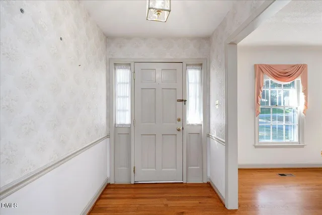 a view of an empty room and window