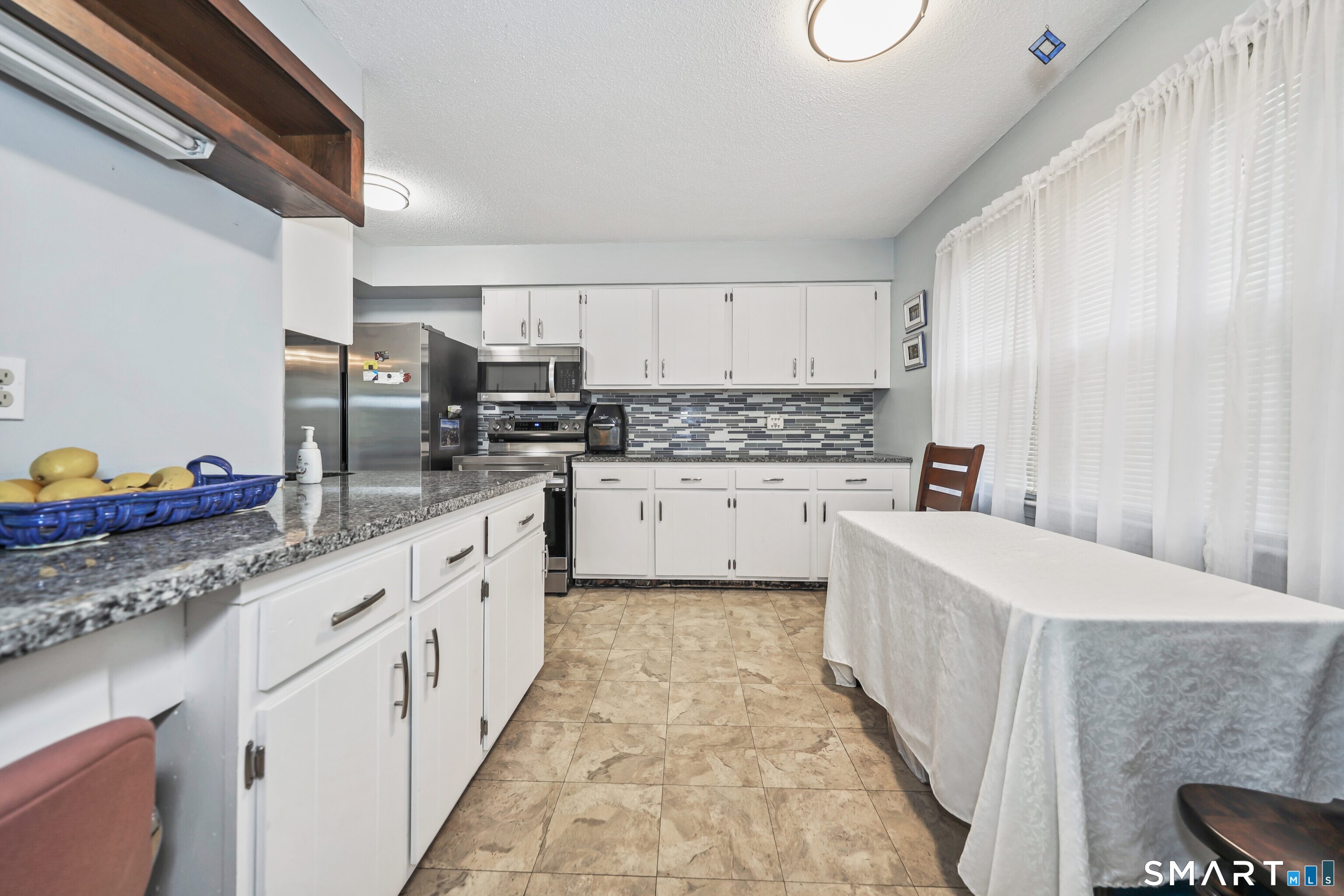 75 Hunter Court, Unit E75 Torrington, CT 06790 - Photo 4 of 31