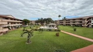 a living room with furniture and window
