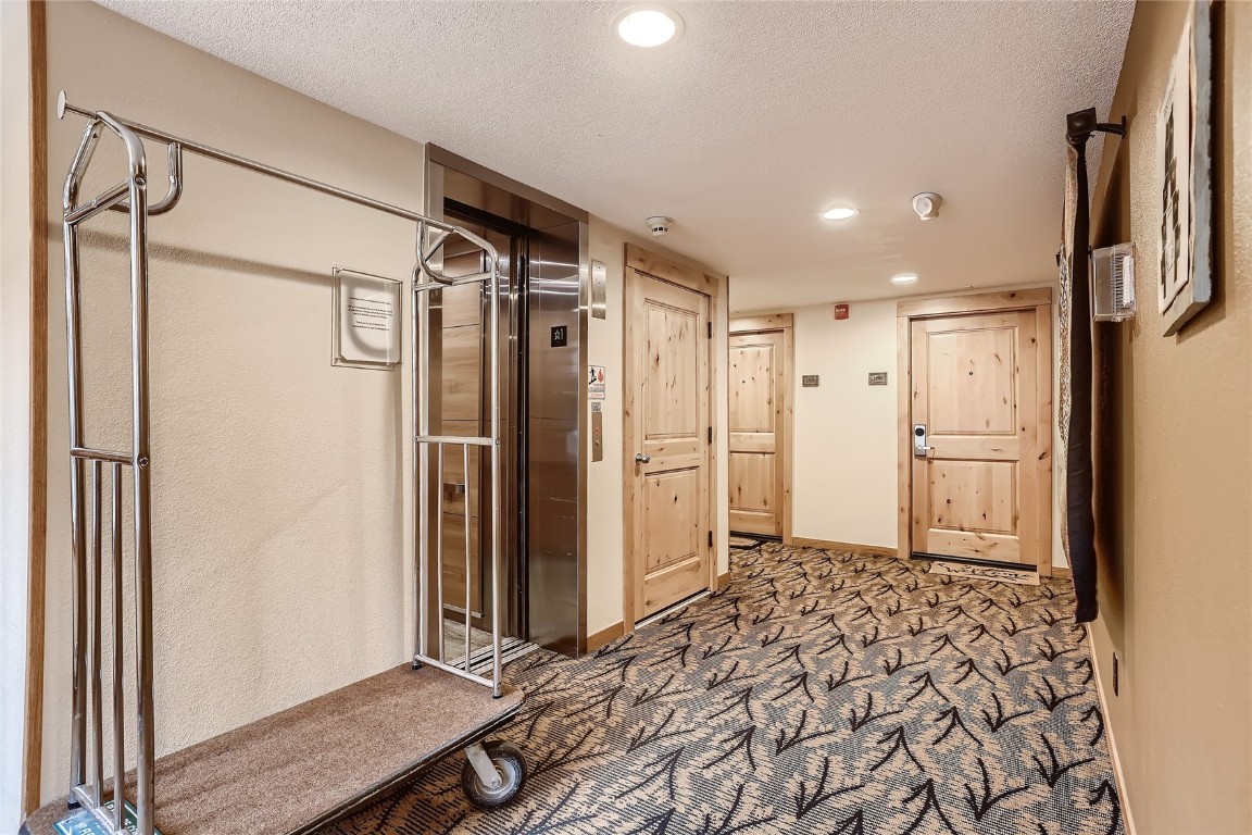 22280 Highway 6, Unit 1709 Keystone, CO 80435 - Photo 23 of 49 Building elevator and luggage carts