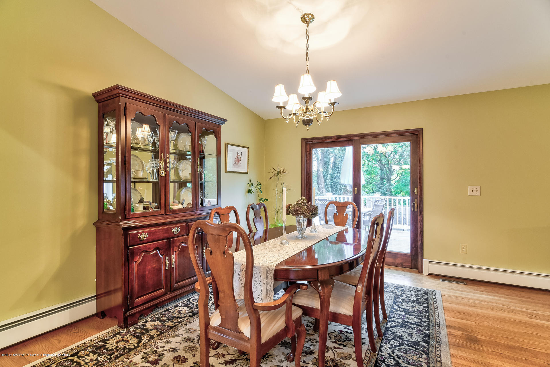 25 Gull Road Middletown, NJ 07748 - Photo 16 of 38 a view of a dining room with furniture window and wooden floor