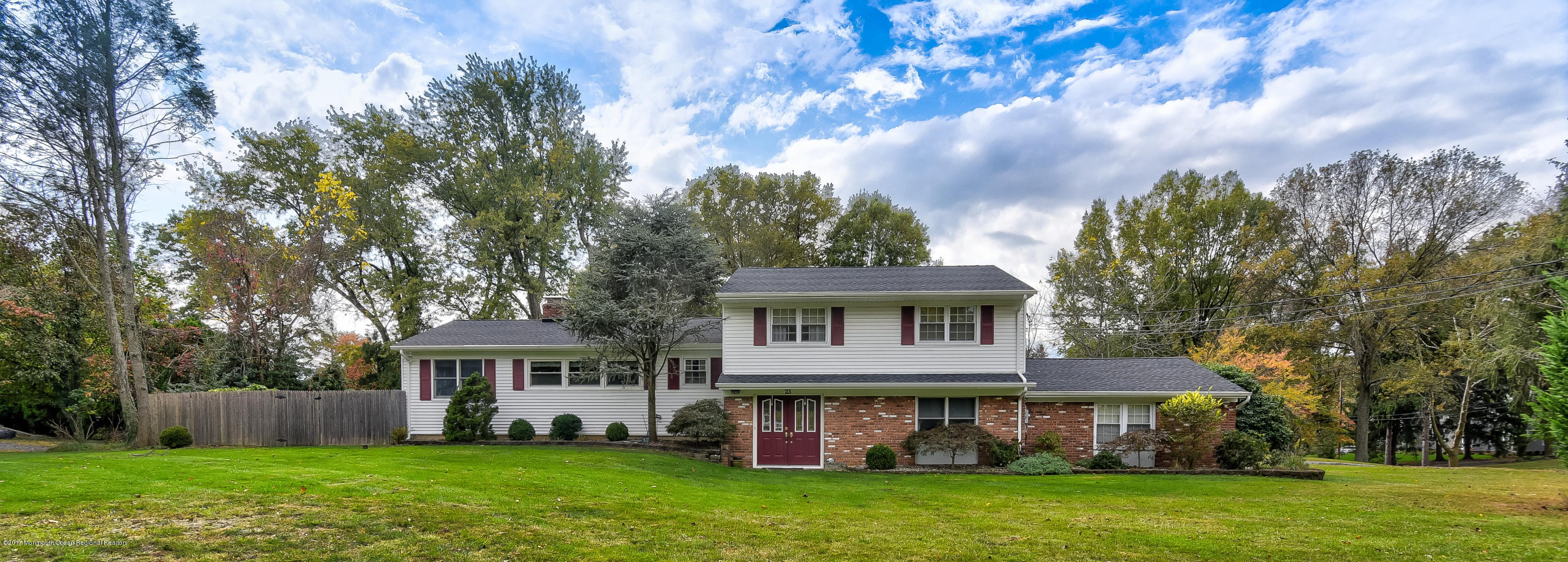 25 Gull Road Middletown, NJ 07748 - Photo 2 of 38 a front view of house with yard and green space