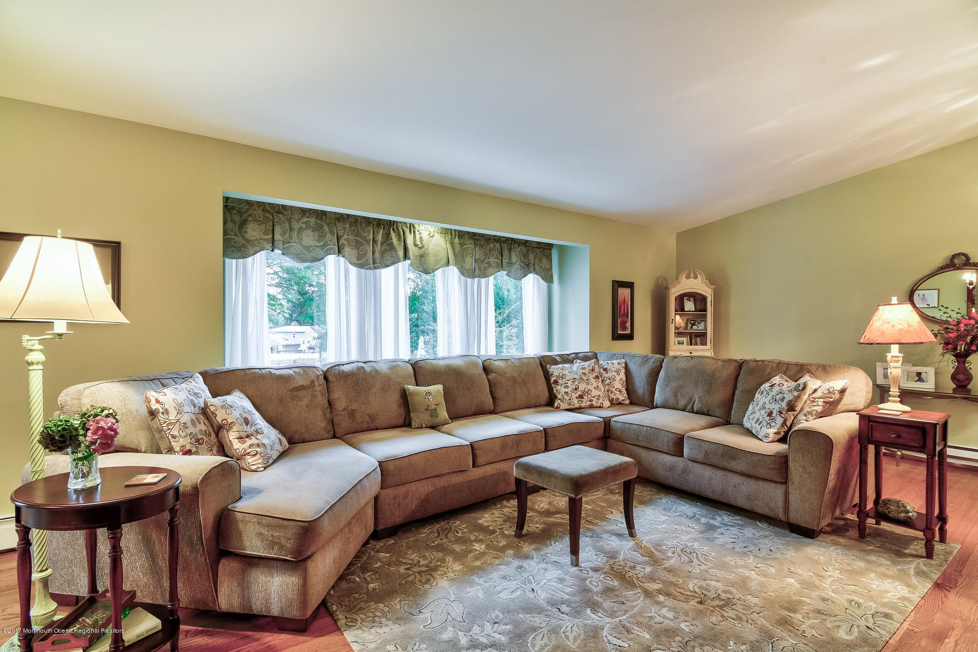 25 Gull Road Middletown, NJ 07748 - Photo 21 of 38 a living room with furniture and a large window