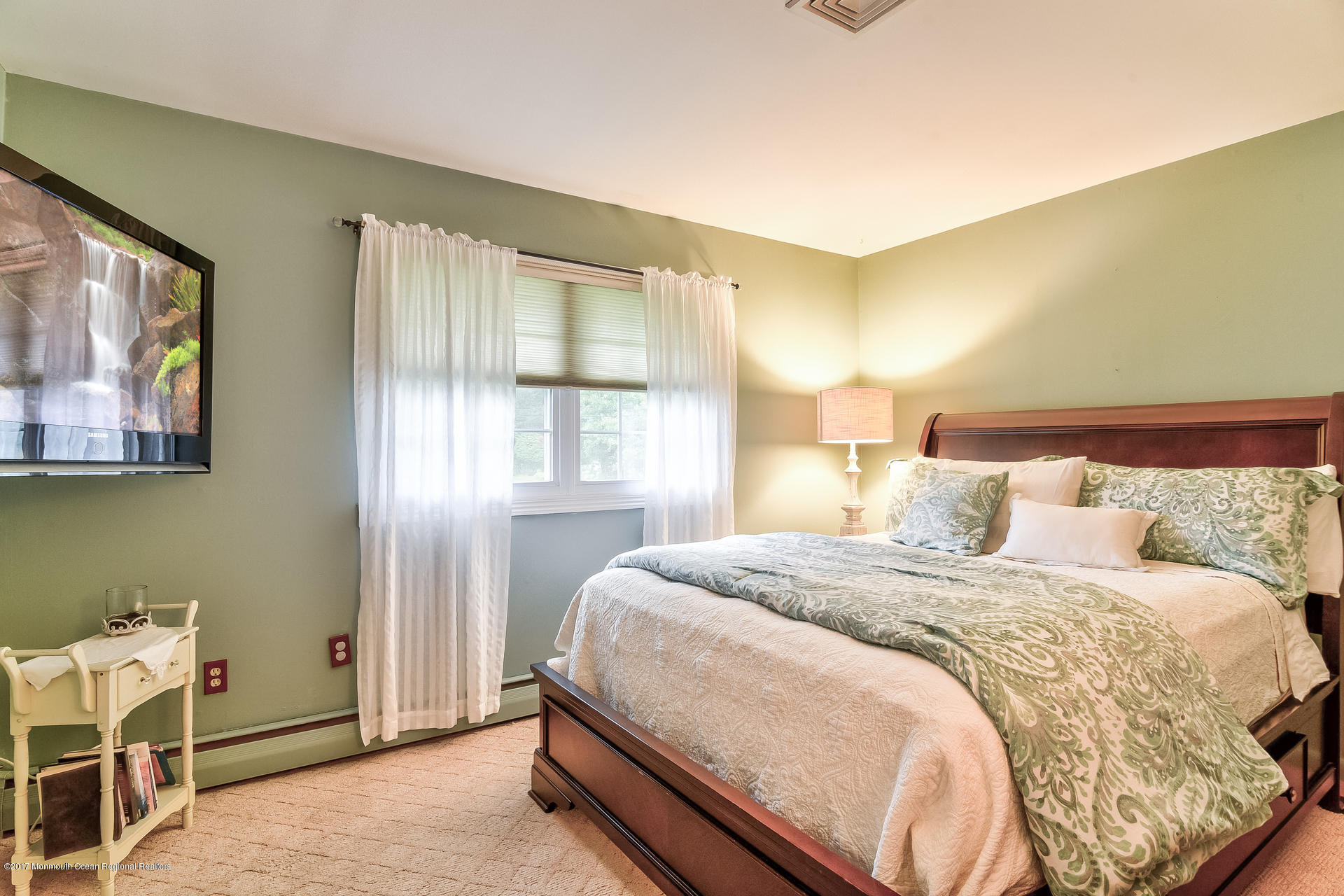25 Gull Road Middletown, NJ 07748 - Photo 26 of 38 a bedroom with a bed and wooden floor