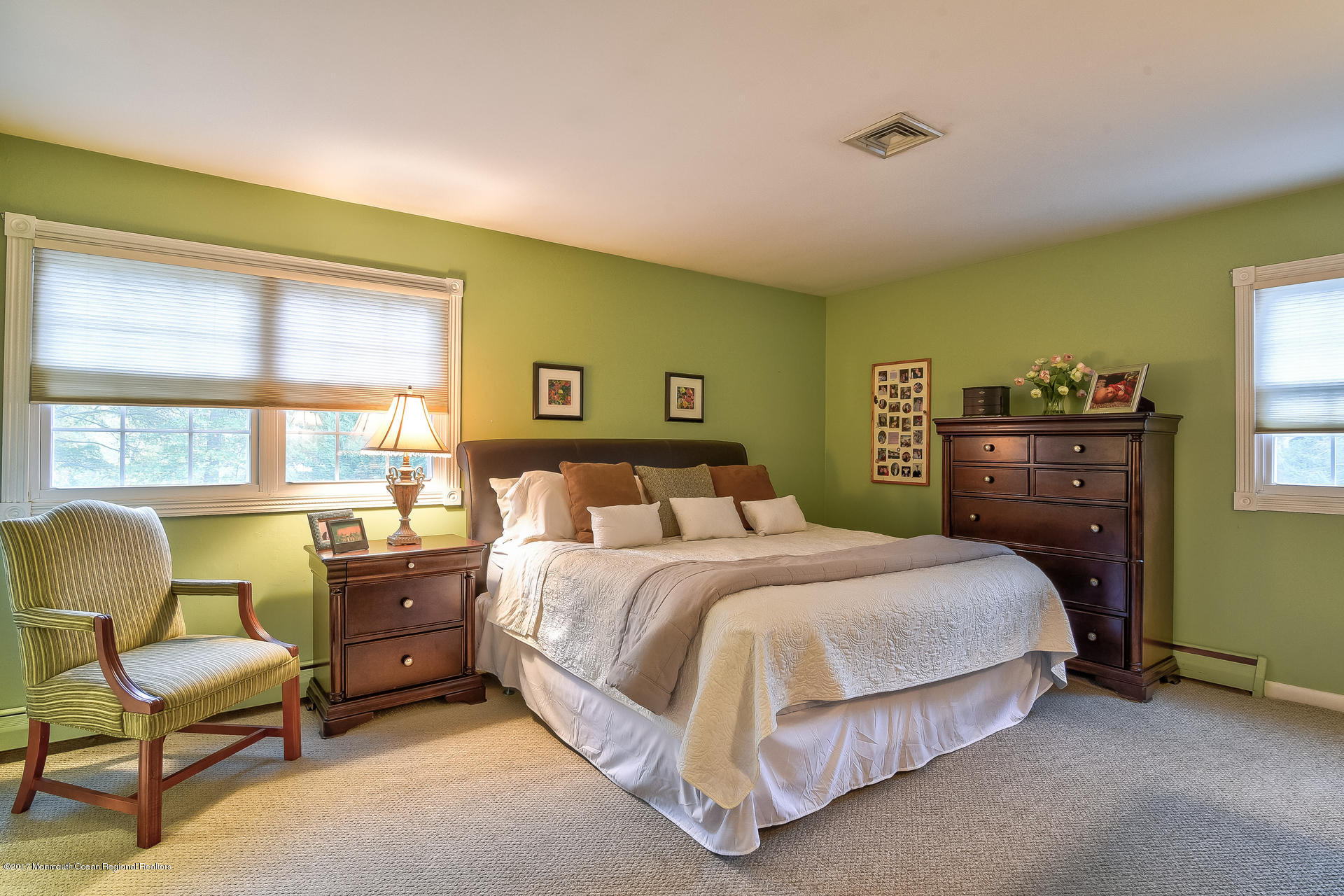 25 Gull Road Middletown, NJ 07748 - Photo 27 of 38 a bedroom with a bed chair and a window