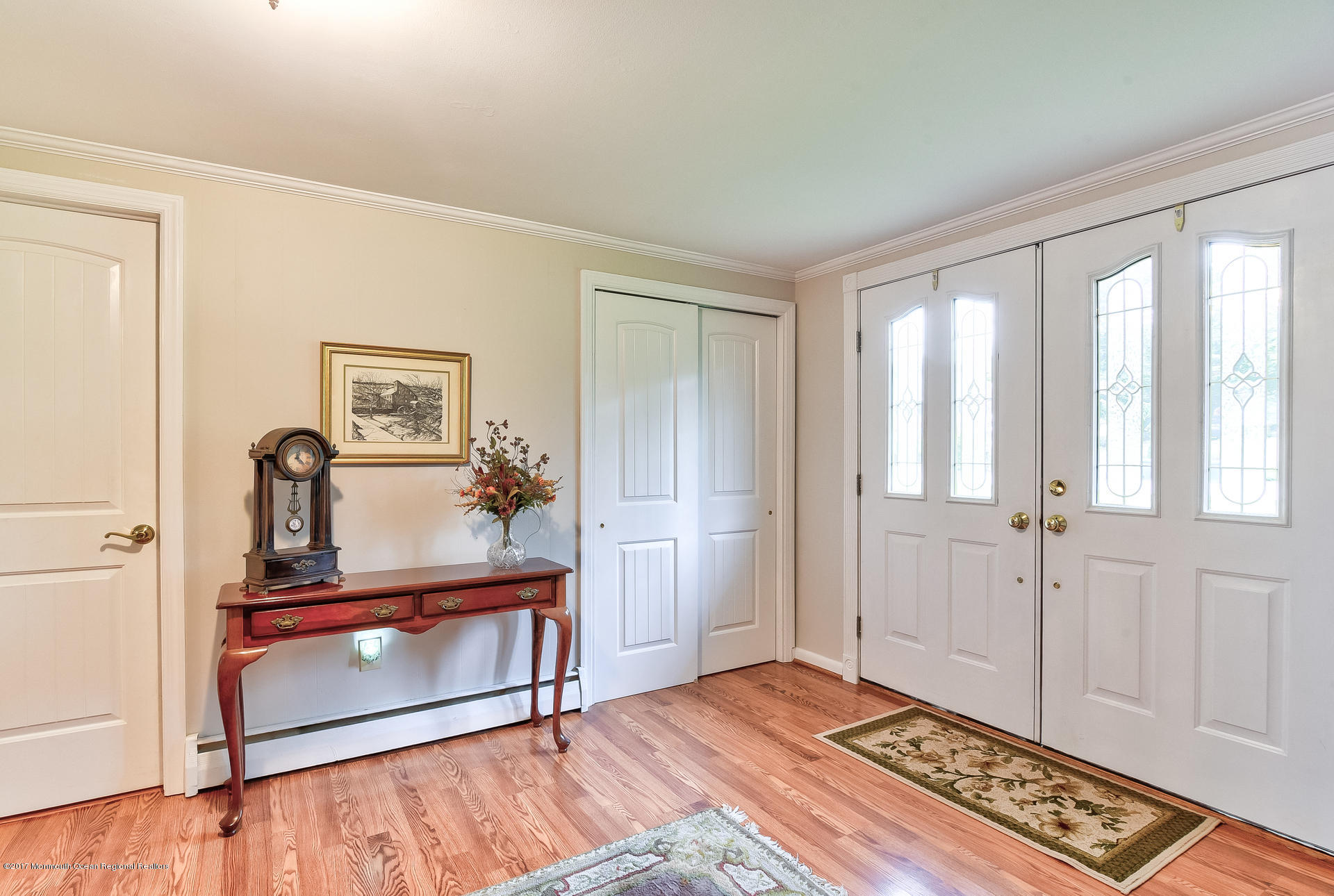 25 Gull Road Middletown, NJ 07748 - Photo 3 of 38 a view of a bedroom with wooden floor and cabinet
