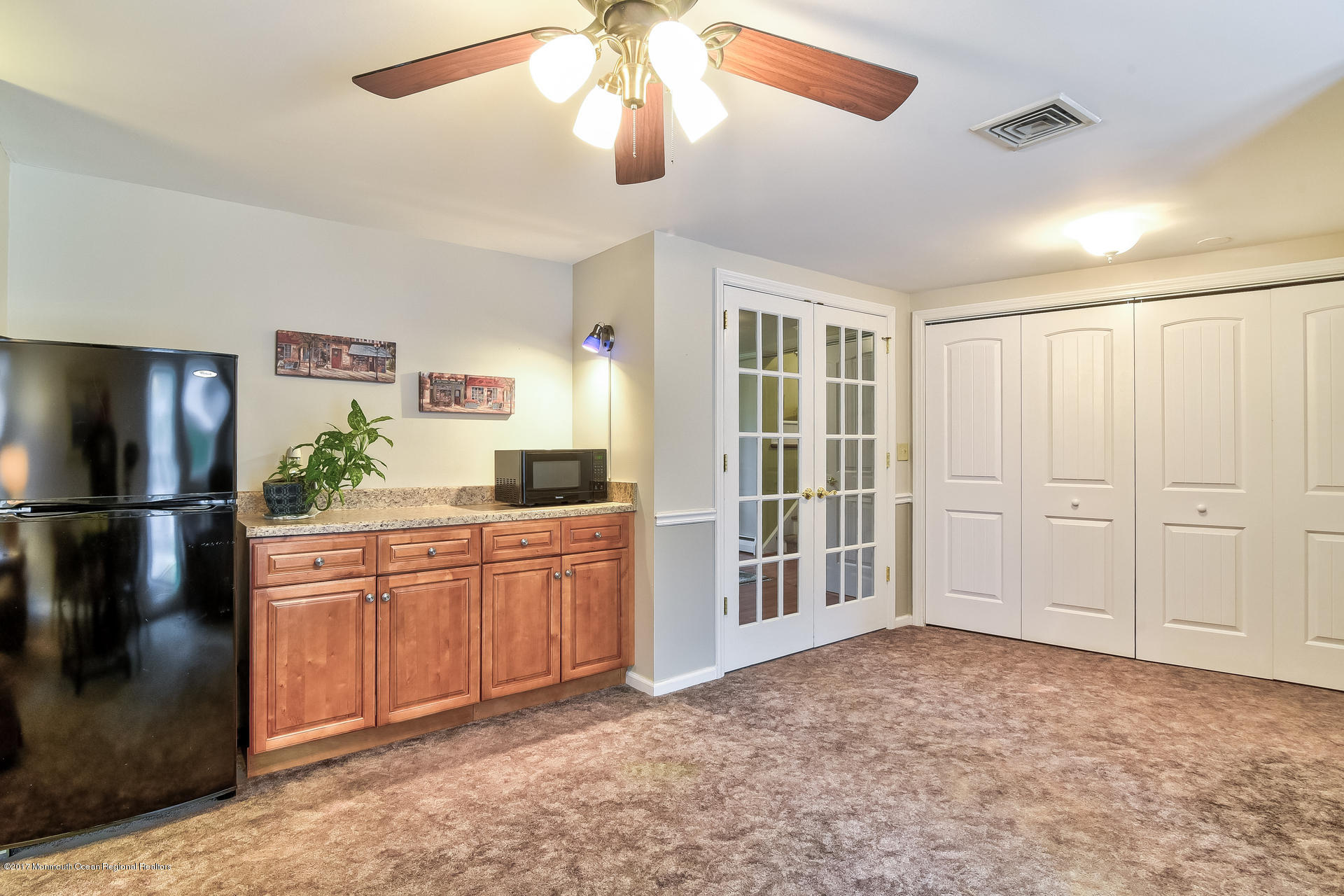 25 Gull Road Middletown, NJ 07748 - Photo 6 of 38 a large kitchen with cabinets and stainless steel appliances