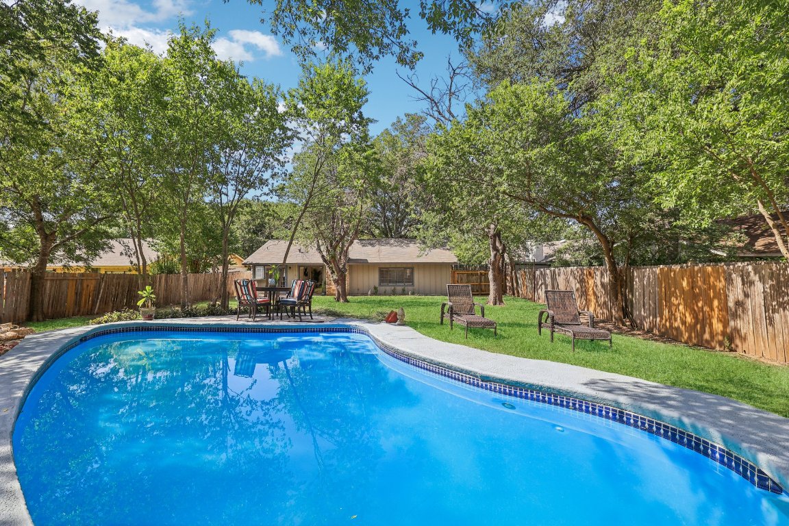 602 Old Stone Road Austin, TX 78745 - Photo 18 of 28 a view of a house with swimming pool