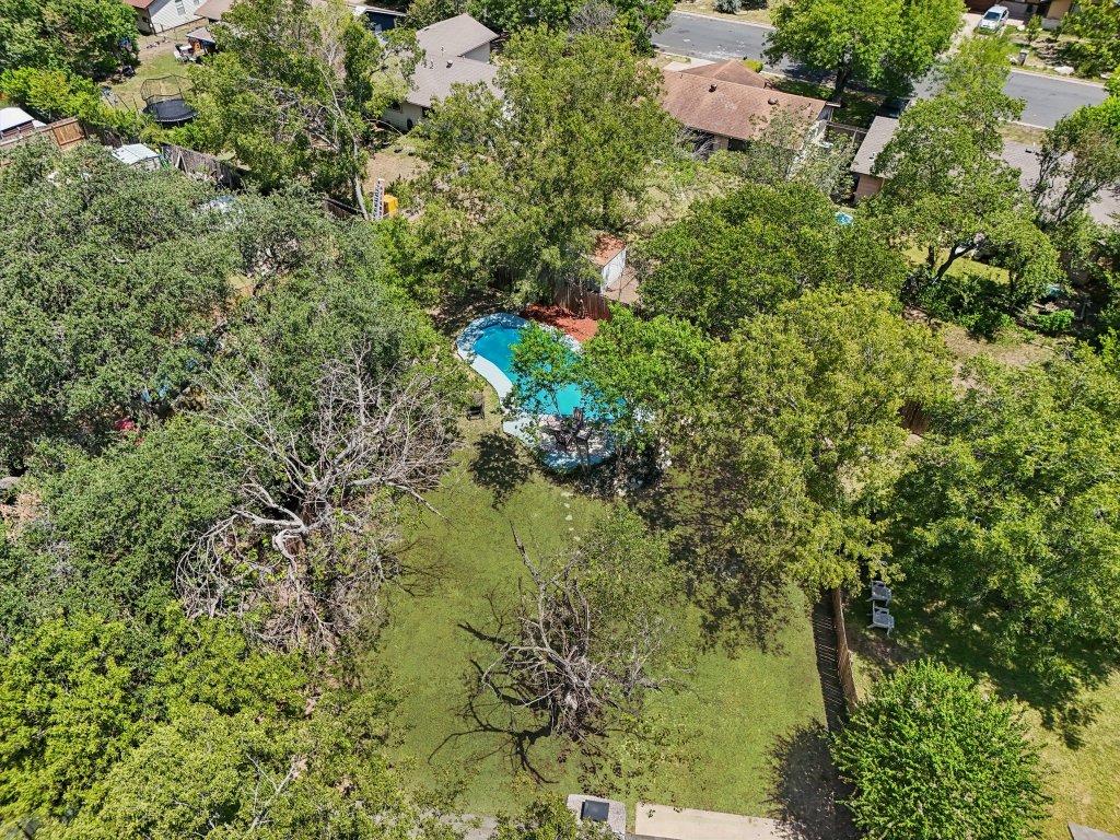 602 Old Stone Road Austin, TX 78745 - Photo 22 of 28 an aerial view of residential house with outdoor space and trees all around
