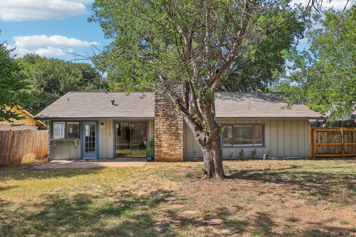 602 Old Stone Road Austin, TX 78745 - Photo 25 of 28 a house with trees in front of it
