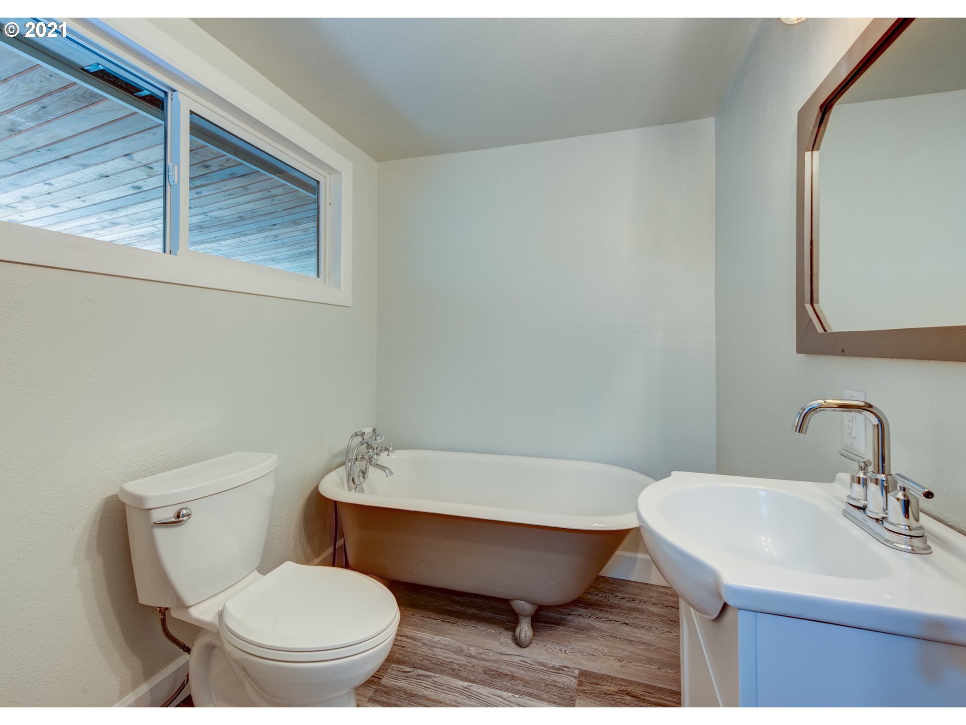82039 Chickaree Road Lowell, OR 97452 - Photo 19 of 30 a bathroom with a sink toilet and mirror