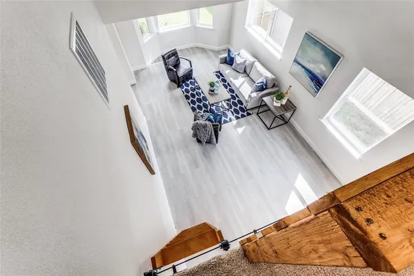 a view of living room with furniture and flat screen tv