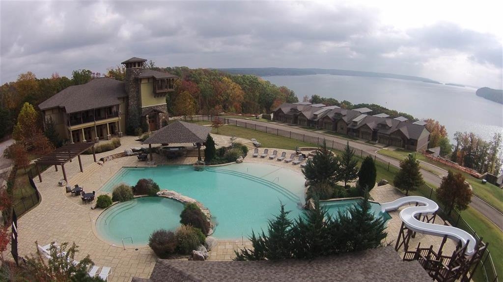 Lot 98 Gentle Ridge Way Savannah, TN 38372 - Photo 10 of 11 a view of a swimming pool with a yard and mountain view
