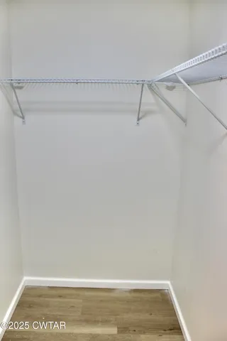 a view of small space with racks on the wall