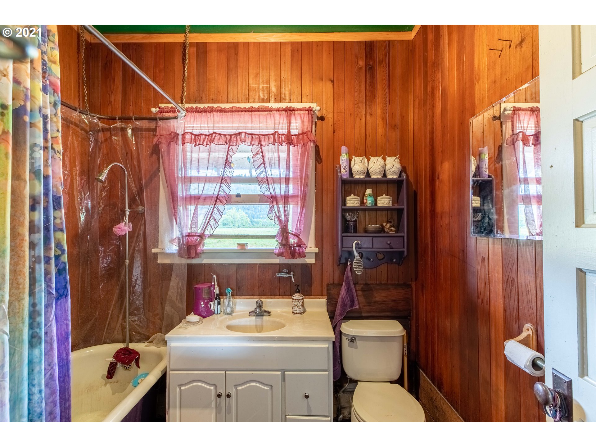 438 Soup Creek Road Reedsport, OR 97467 - Photo 20 of 30 a bathroom with a sink toilet and shower