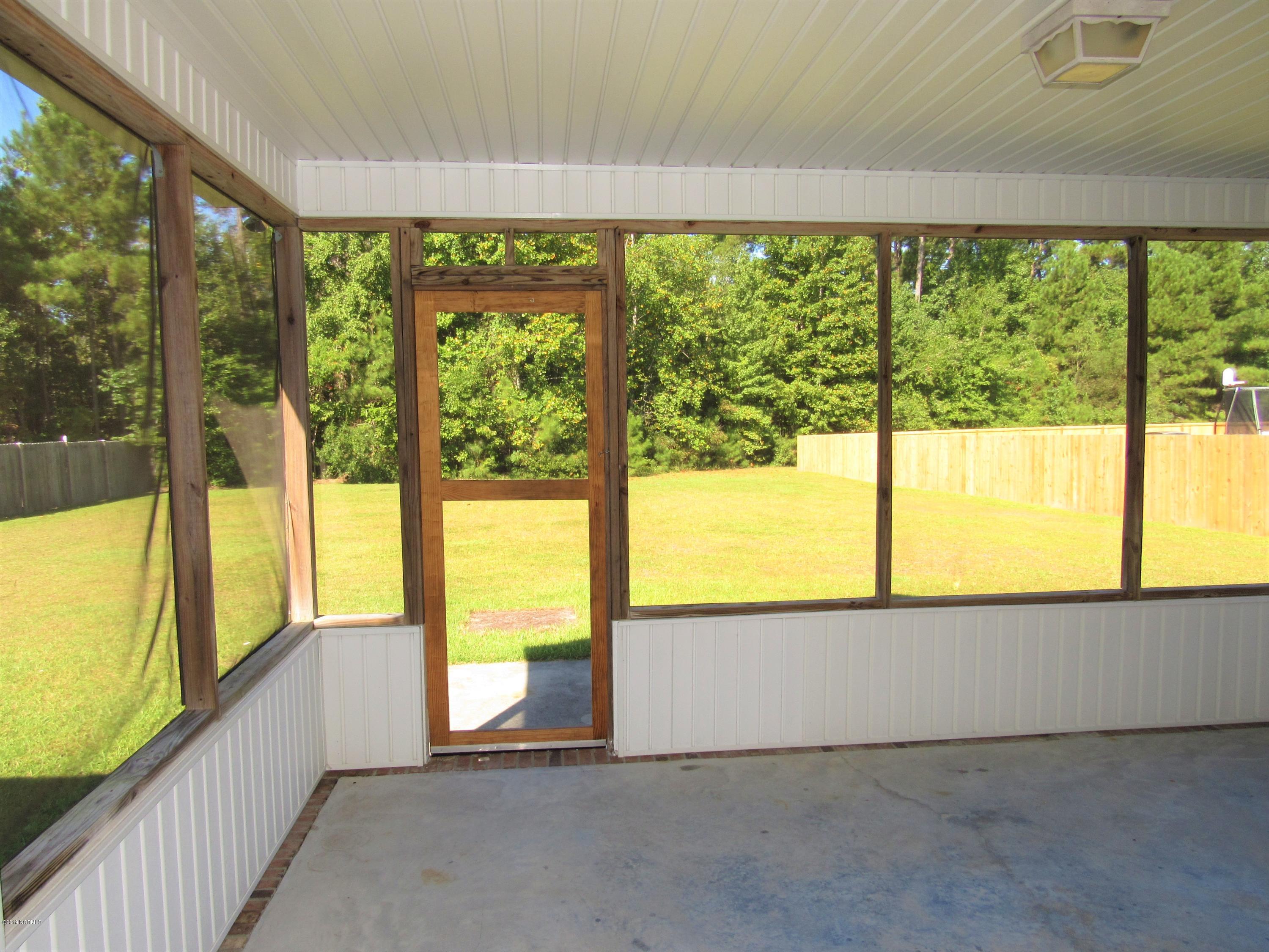 413 Marsha's Way Havelock, NC 28532 - Photo 13 of 48 Screened-in back porch