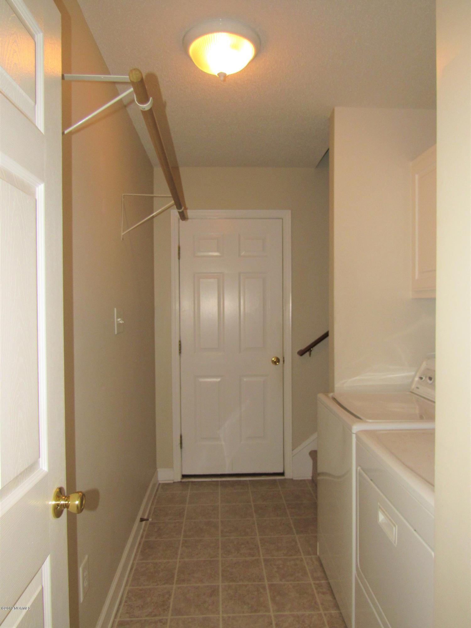 413 Marsha's Way Havelock, NC 28532 - Photo 28 of 48 Hallway to Garage and FROG