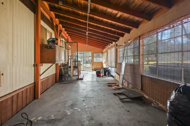 a view of a balcony with chairs