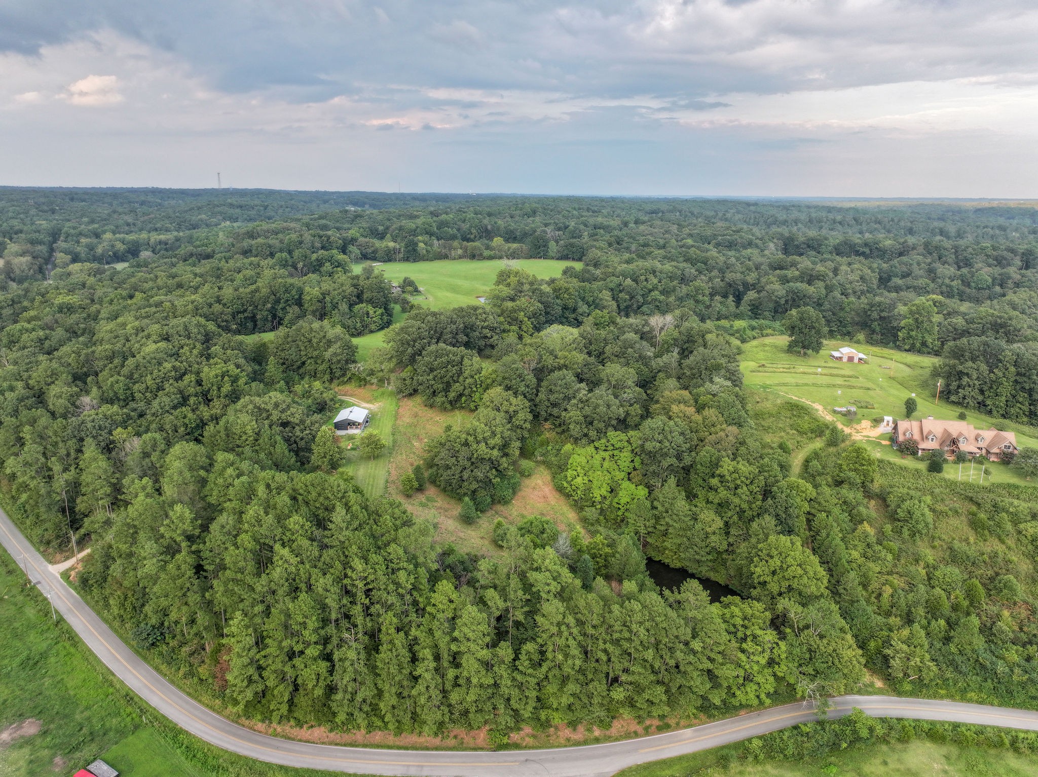 0 South Eno Road Dickson, TN 37055 - Photo 5 of 7 a view of a garden from a balcony