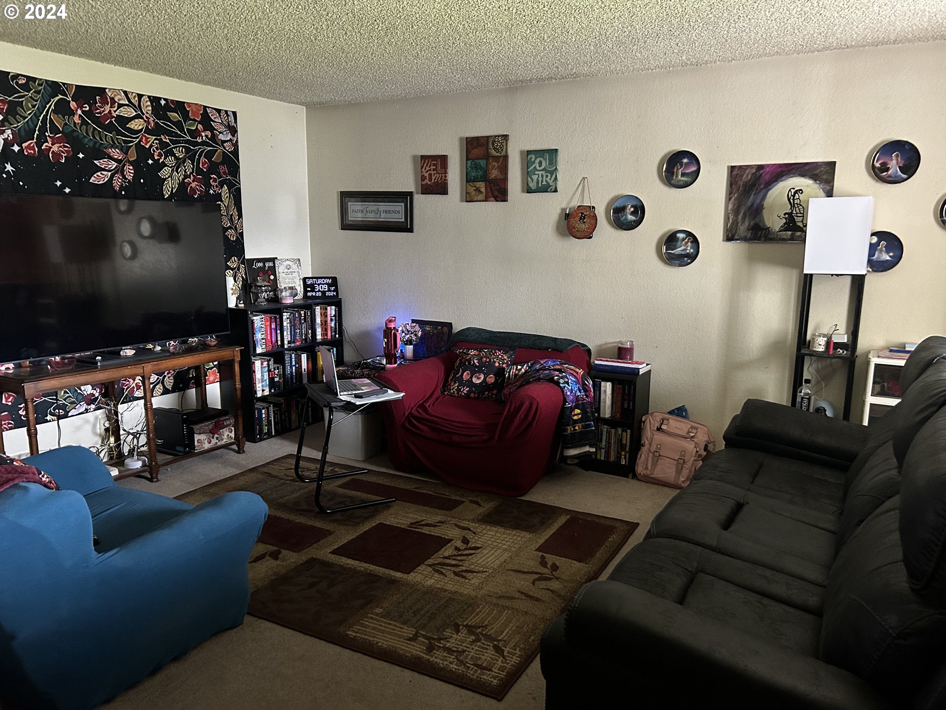4807 Daisy Street Springfield, OR 97478 - Photo 4 of 12 a living room with furniture and a flat screen tv